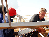 Negotiate with building contractor Steel building contractor