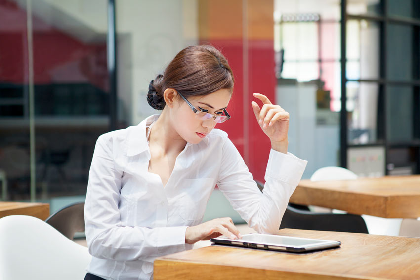 businesswoman working with ipad