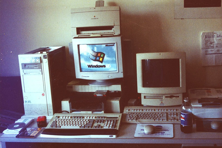 Old office setting with large PCs.