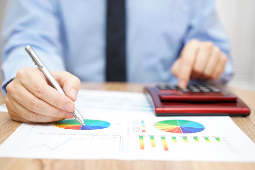 Businessman is analyzing financial reports