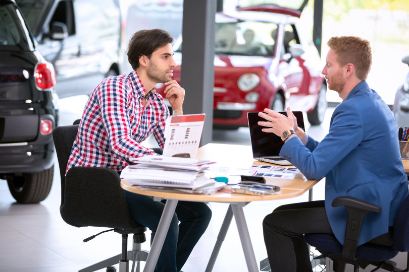 Discussing with a car lease dealer