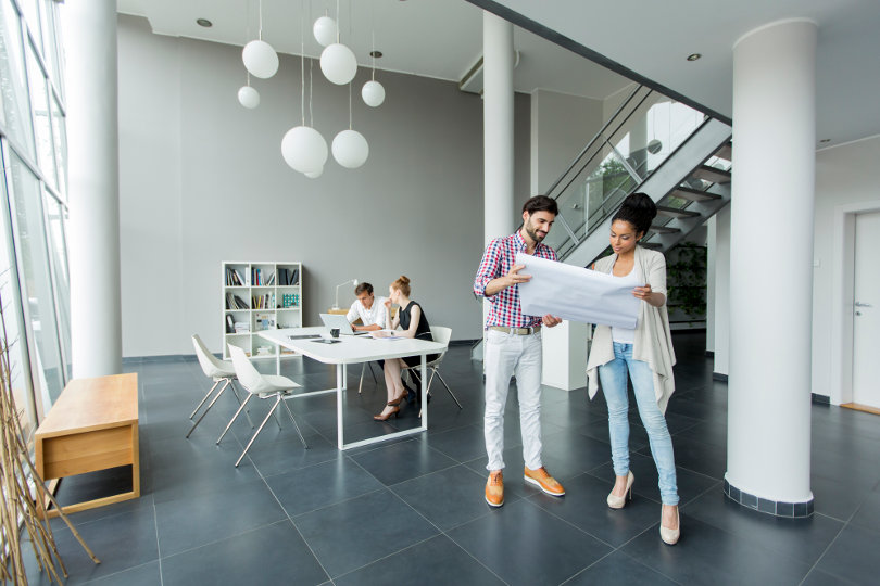 Employees working in a clean office space