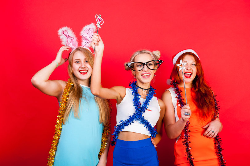 Event attendees in a photo booth snap