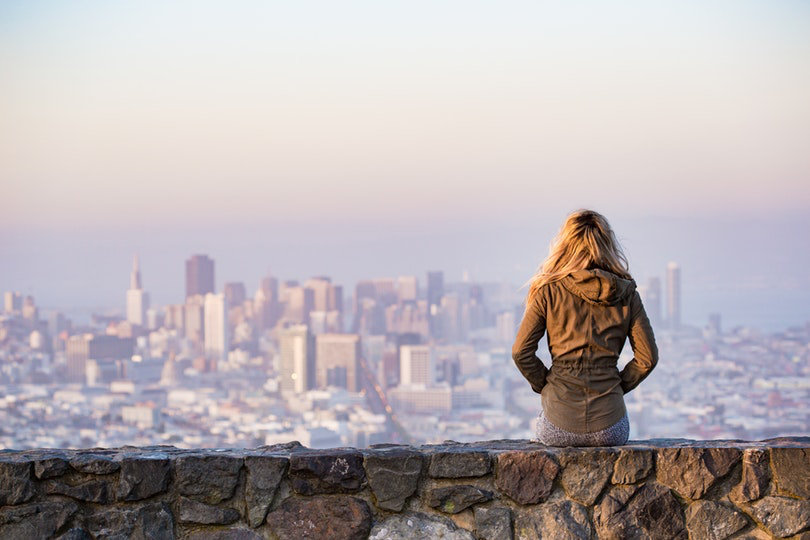 Busineswoman sitting overlooking San Francisco