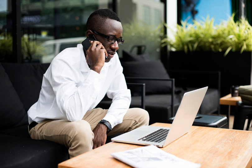 Busy businessman making a call