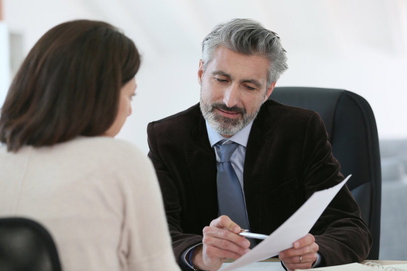 Attorney discussing a lawsuit with a client