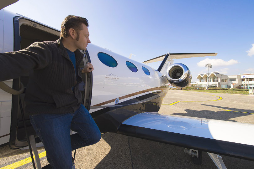 Entrepreneur doing private jet travel