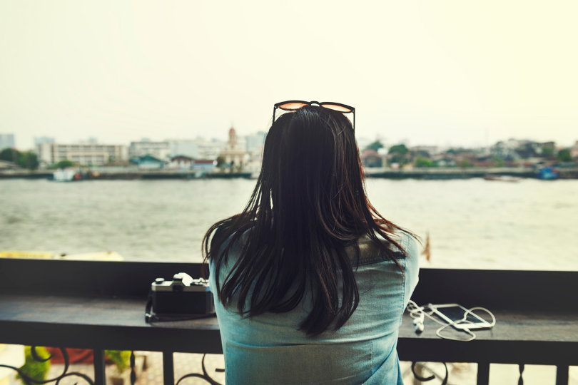 Business woman traveling while enjoying the scenery