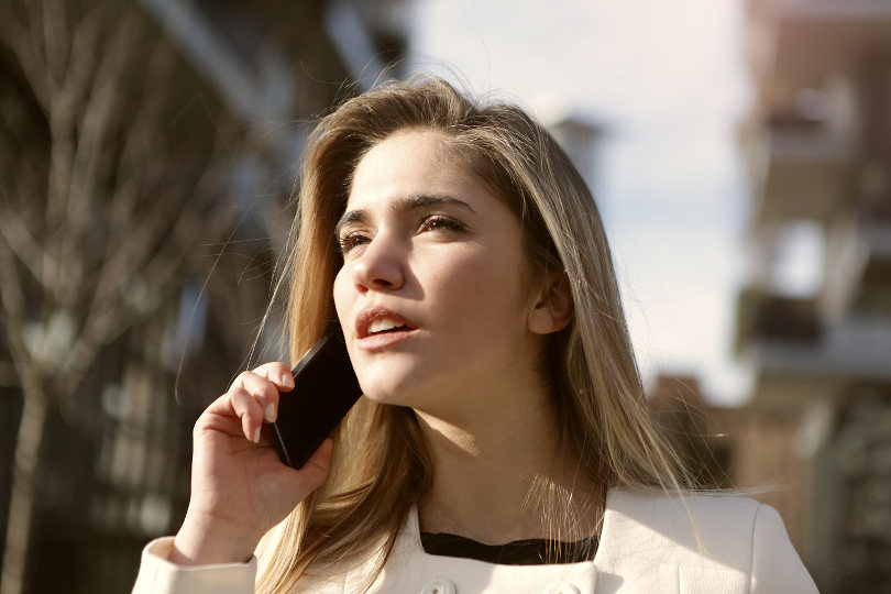 Businesswoman making business call