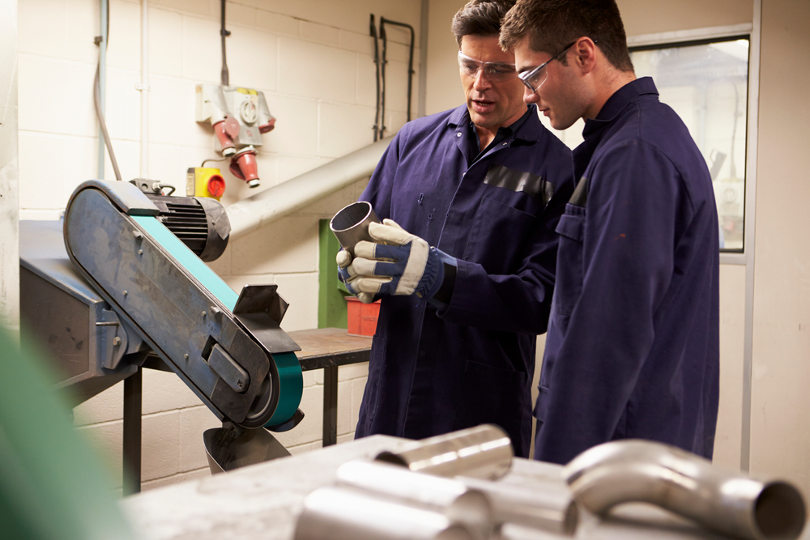 Engineers in a small manufacturing plant