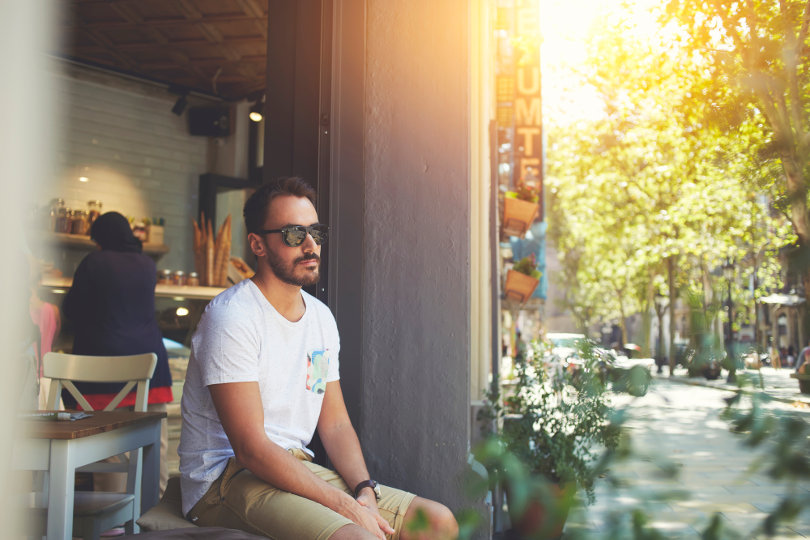 Businessman sitting outside