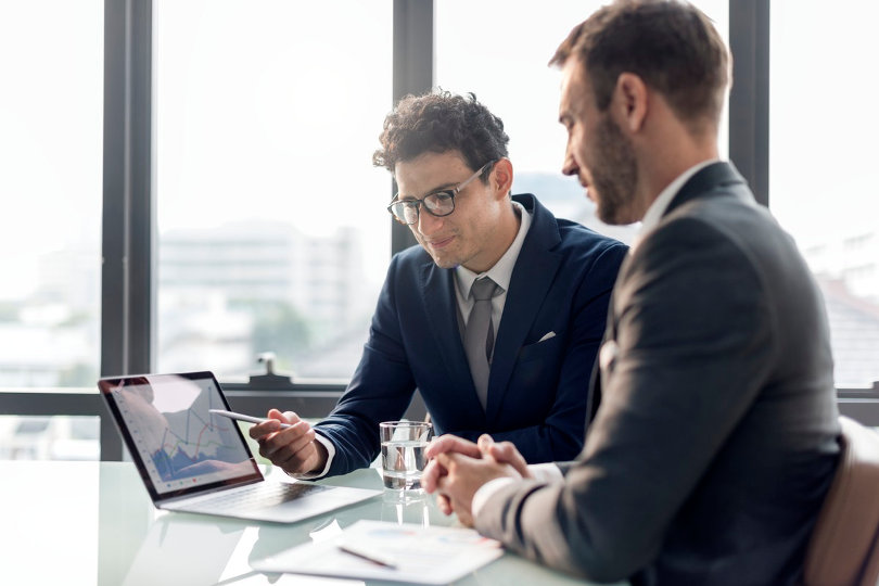 Businessmen researching new industry