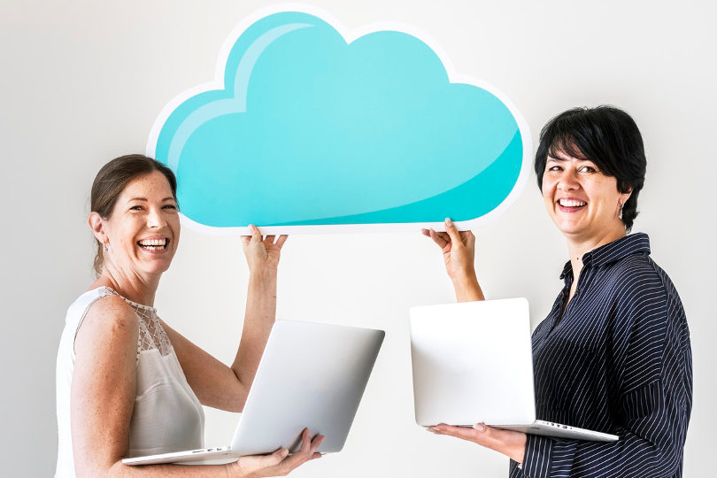 Casual businesswomen using cloud computing