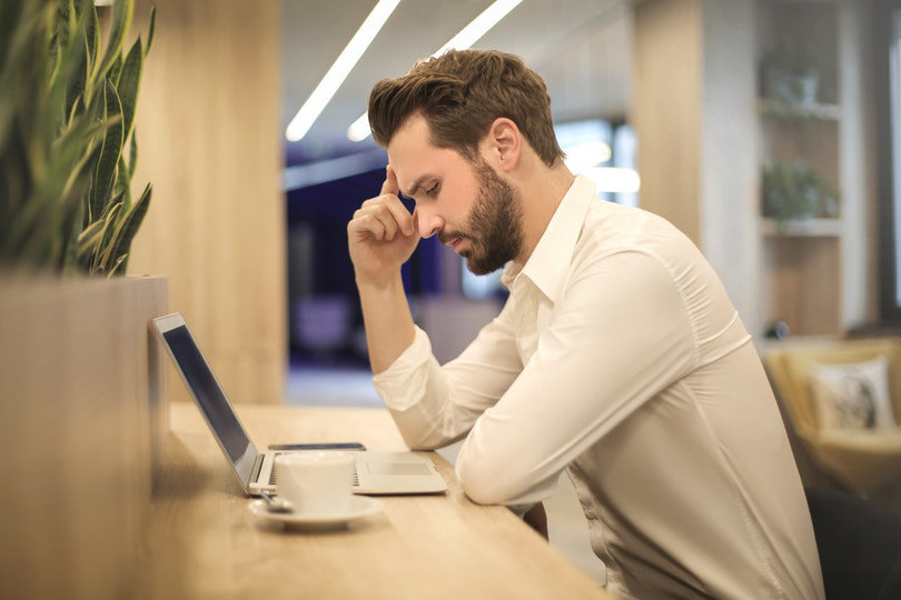 Unhappy businessman resisting changes