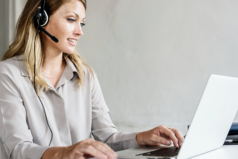 Call center staff serving customer