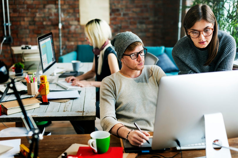 Marketing team analyzing marketing data