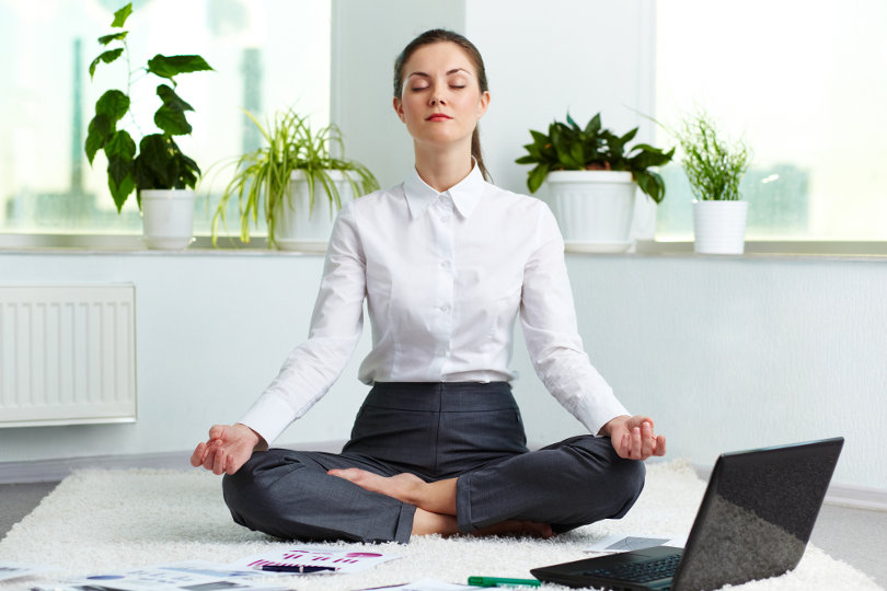 Businesswoman practicing mindfulness