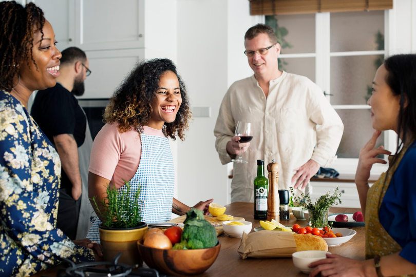 Business people taking cooking class