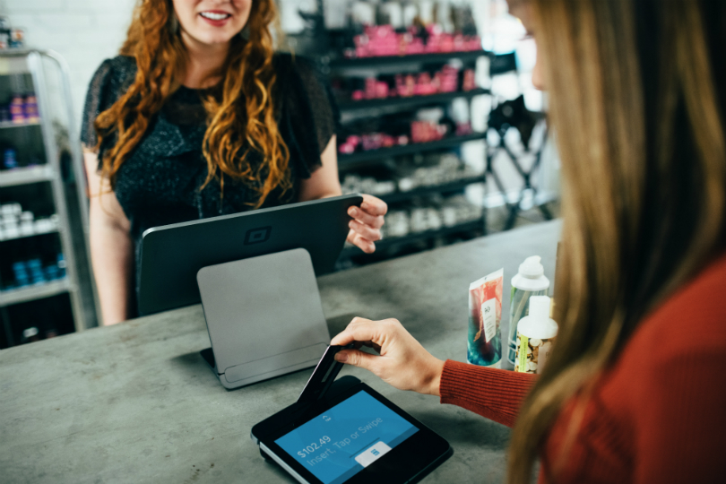 Customer transacting with a business owner