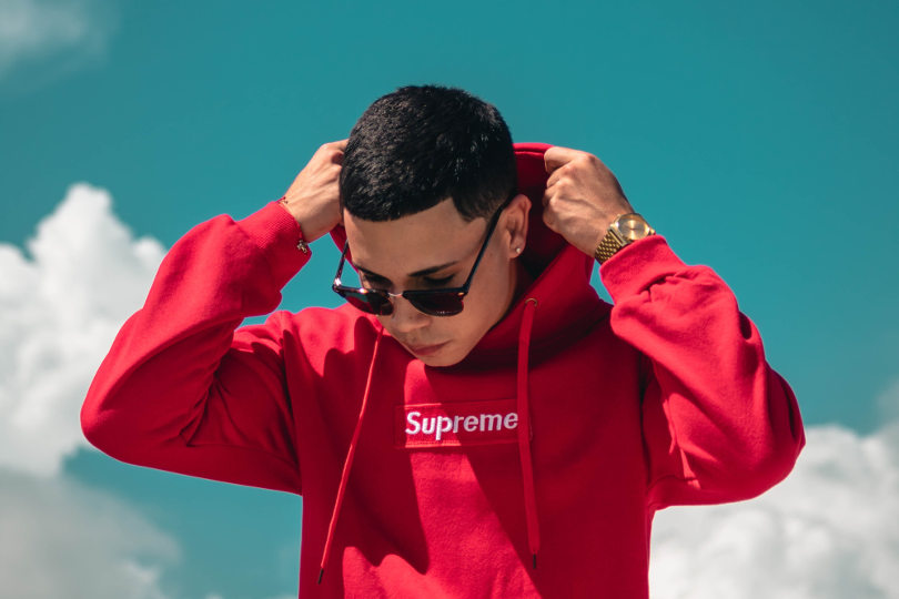 Man wearing Supreme hoodie
