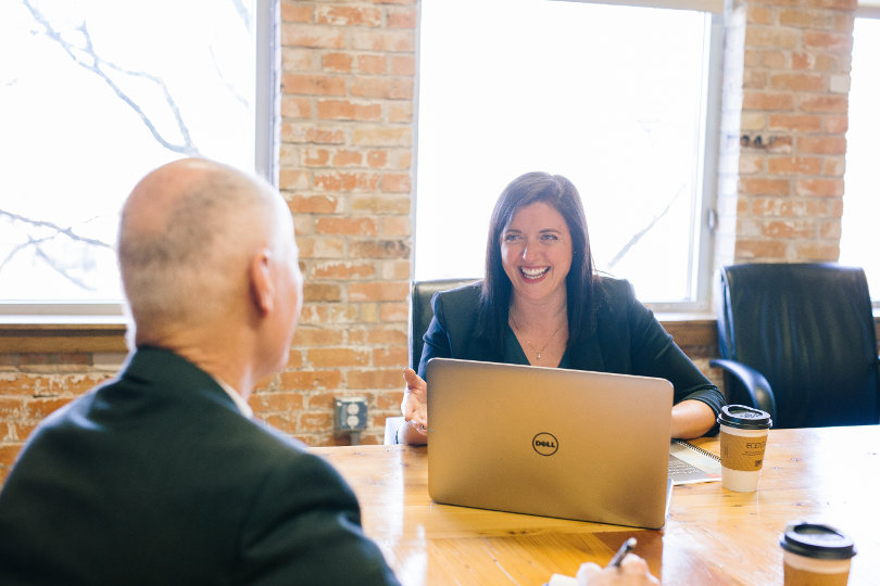 Sales rep discussing with a client