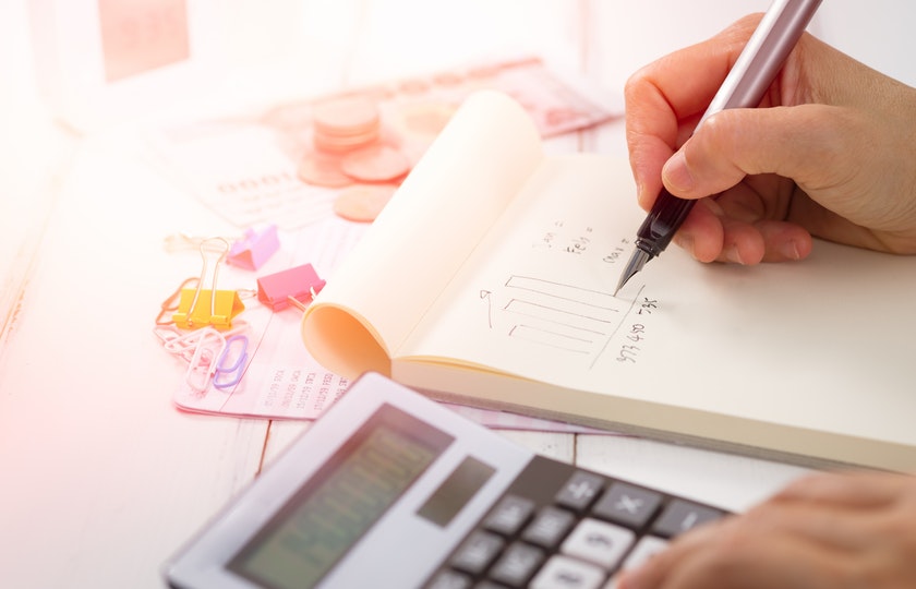 Business owner calculating taxes