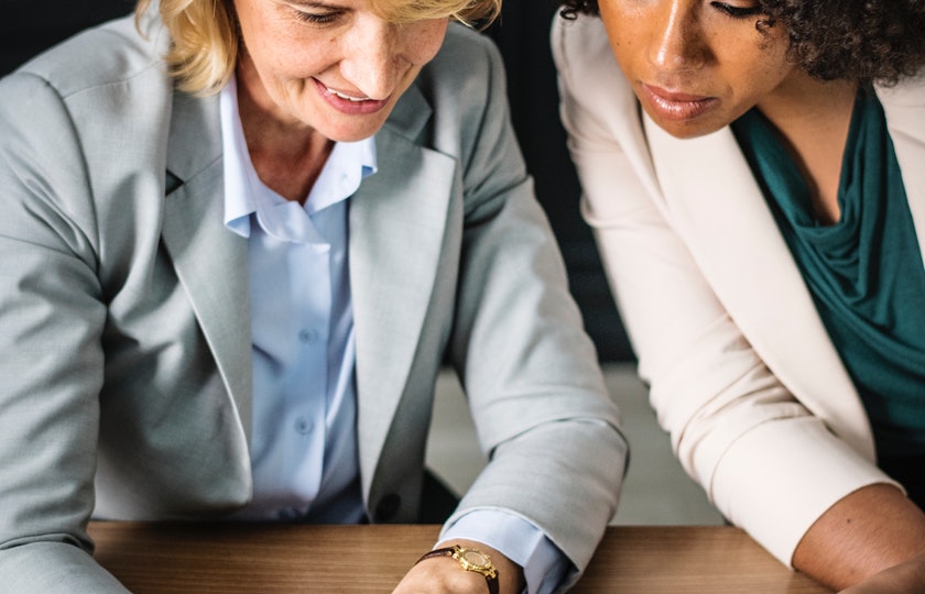 Manager mentoring her team member