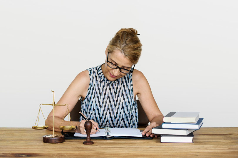Business lawyer processing lawsuit filing