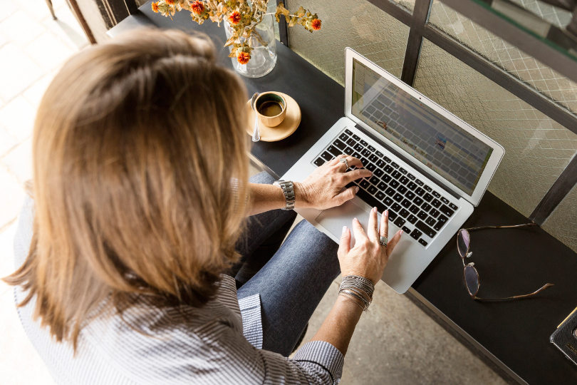 Businesswoman editing PDF document on a Windows laptop
