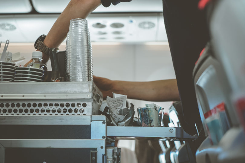 Stewardess serving passengers