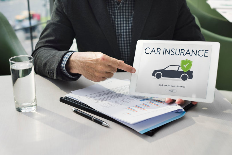 Car insurance agent explaining coverage