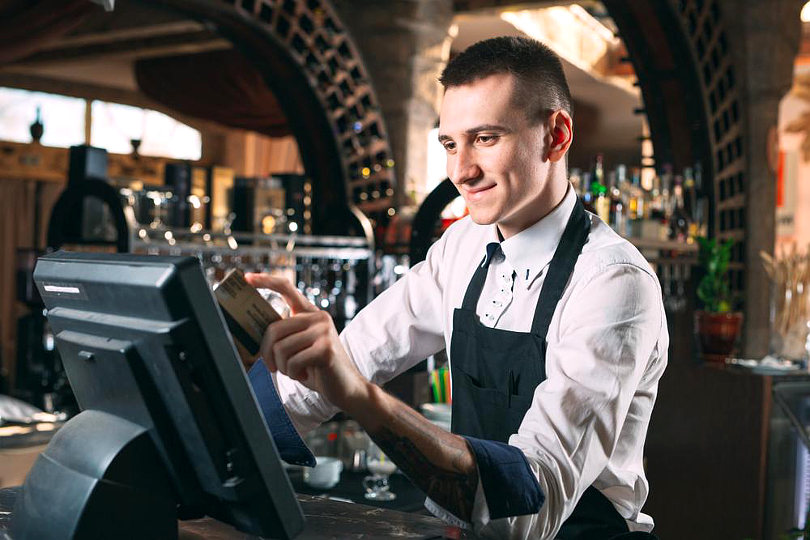 Restaurant staff using POS system