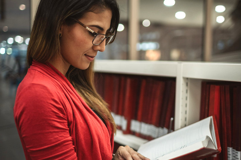 MBA student learning in library