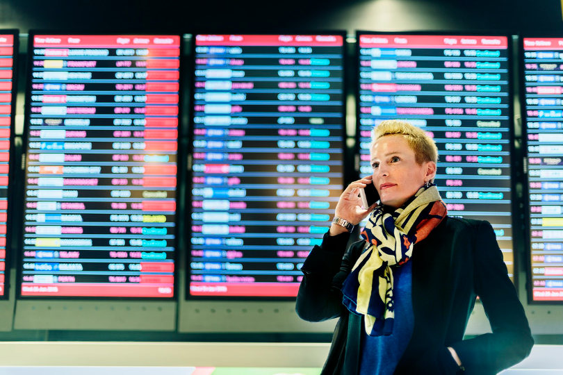 Business traveler making calls