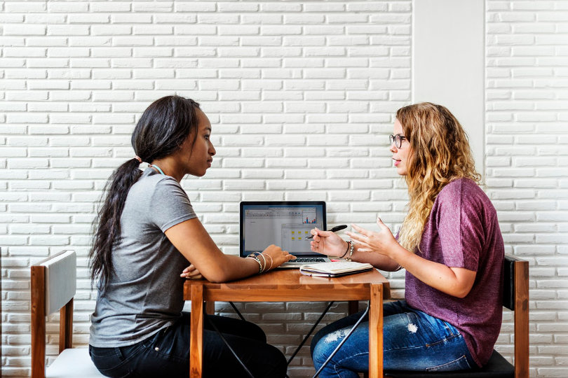 College students discussing future plan after graduation