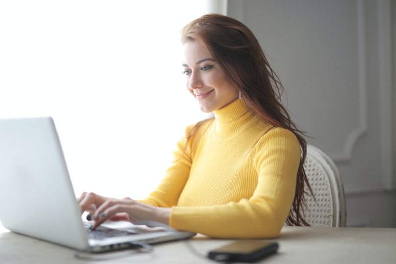 Businesswoman running a business with a laptop