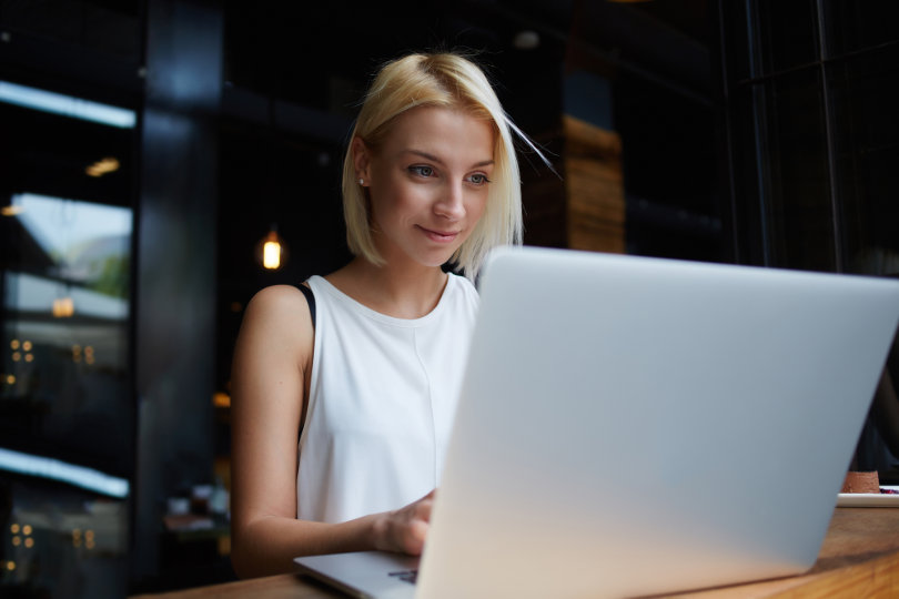 Businesswoman accessing Internet