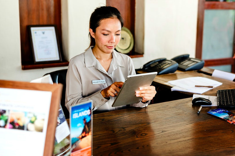 Hotel manager using hotel management software