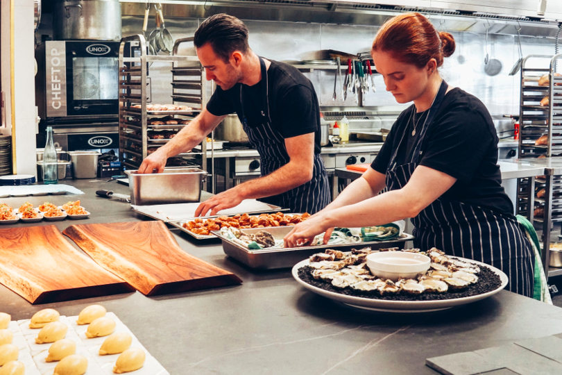 Busy chef in a restaurant kitchen