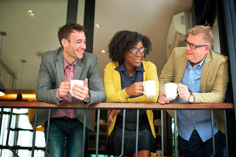 Employees drinking coffee during break