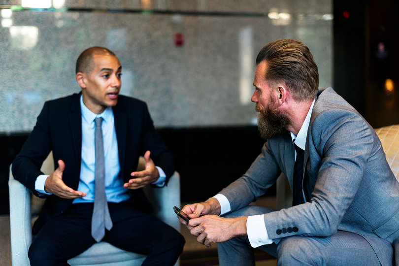 Businessmen having serious talk