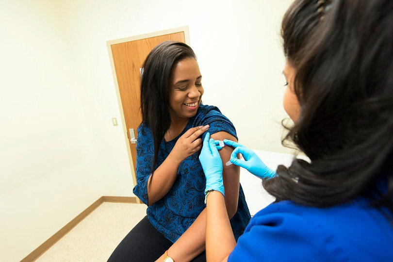 COVID 19 vaccine administering