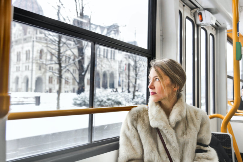 Businesswoman traveling by bus