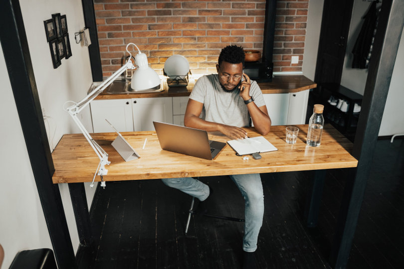 Small business owner monitoring the cloud