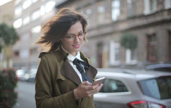 Businesswoman using new app