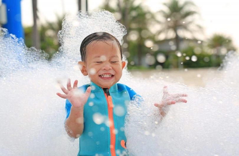 Kid having fun in foam