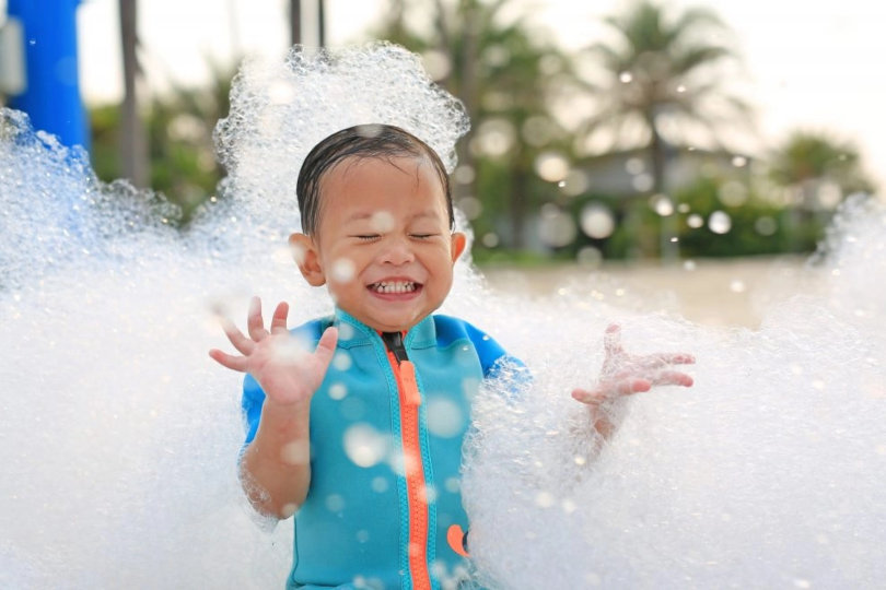 Kid having fun in foam