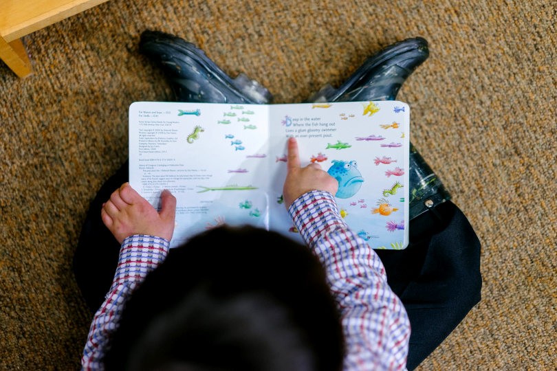 Child reading book