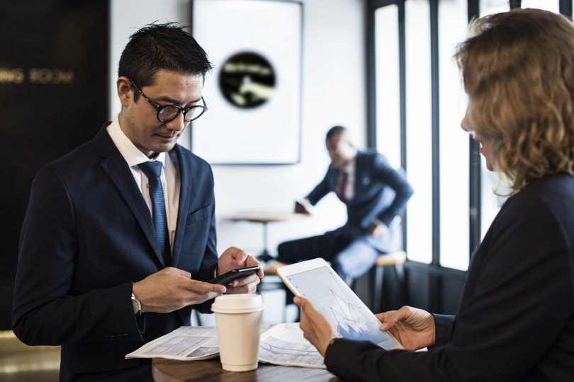 Business people accessing finance resources